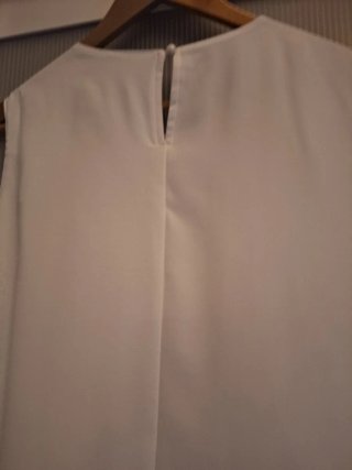 Blusa blanca plisada