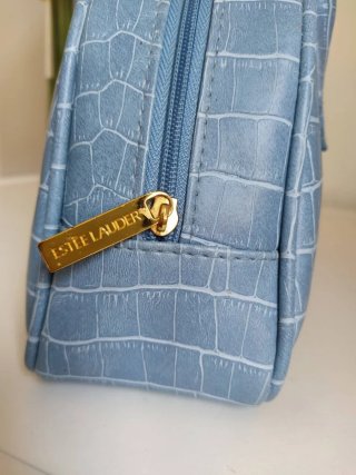 Bolso mini azul Estée Lauder