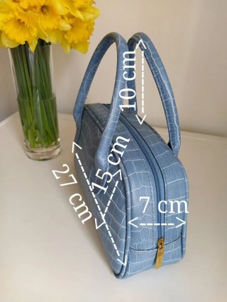 Bolso mini azul Estée Lauder