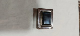 Broche para bolso con piedra azulada grisáceo