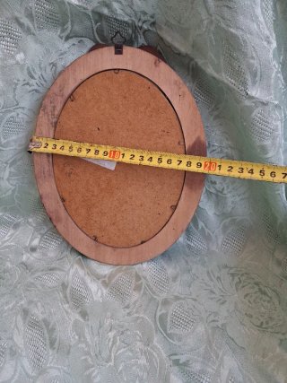 Cornice ovale vintage con fiocco