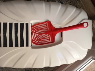 Arenero para gatos blanco y rojo nuevo,sin usar
