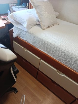 Cama nido con cajones de madera maciza.