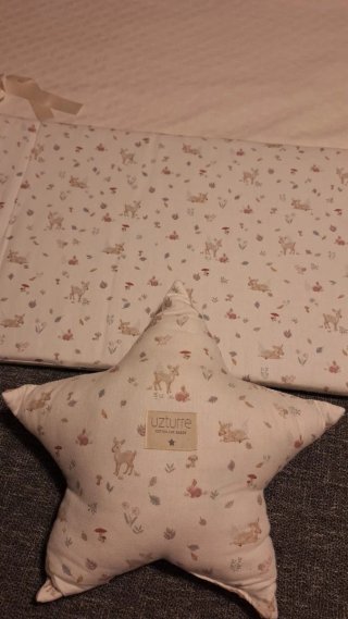 Protector de cuna con estampado infantil