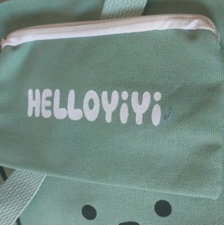 Bolso verde con monedero