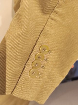Traje chaqueta y falda micropana Mango