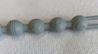 Sujetachupetes silicona gris con clip