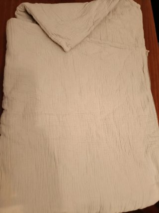 Saco de dormir para bebé de zara home.