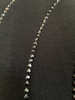 Top negro cuello alto sin mangas