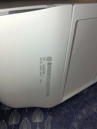 Impresora HP azul y blanca