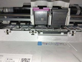 Impresora HP azul y blanca