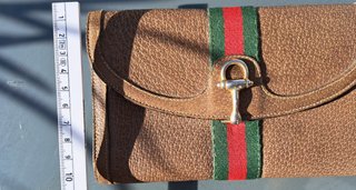 Portafoglio Gucci in pelle marrone con banda