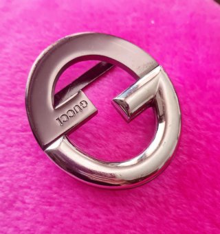 Fibbia cintura Gucci argento.