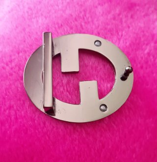 Fibbia cintura Gucci argento.