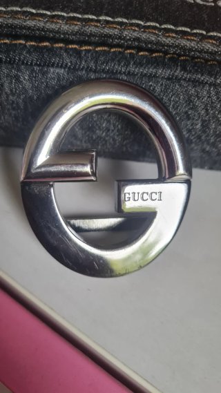 Fibbia cintura Gucci argento.