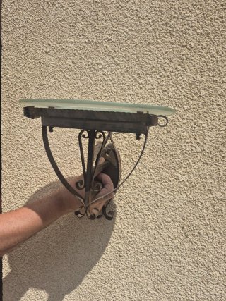 Lámpara de pared de hierro y cristal