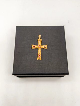 Cruz oro 18kt con piedras rojas