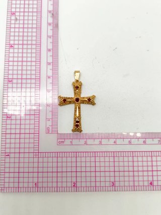 Cruz oro 18kt con piedras rojas