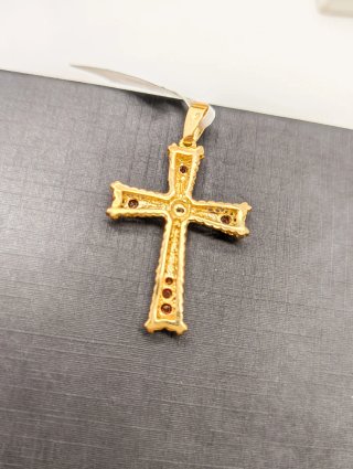 Cruz oro 18kt con piedras rojas