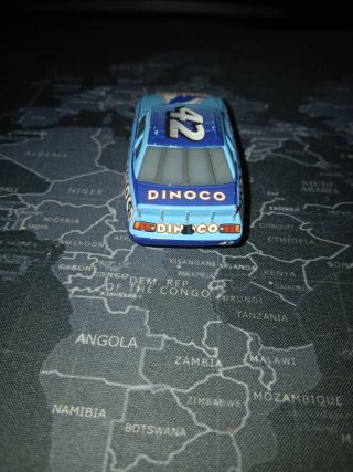 Coche de juguete Cars Dinoco 42