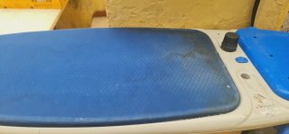 Plancha y tabla de planchar. Funcionando.