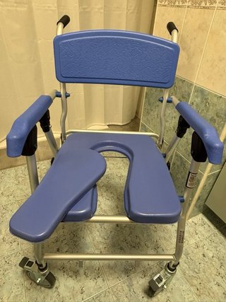Silla de ducha con ruedas