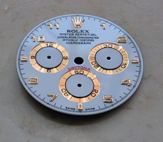 Rolex Daytona 116528/518 esfera blanca árabe oro a