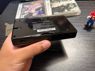 Nintendo DSi Nera + Pokémon Perla + Race Driver G