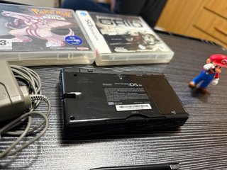 Nintendo DSi Nera + Pokémon Perla + Race Driver G