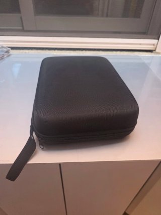 Aspiradora Portátil con estuche. Nueva.