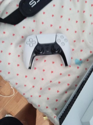 PS5 con 3 juegos y maleta