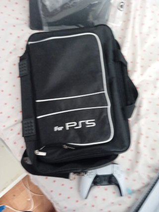 PS5 con 3 juegos y maleta