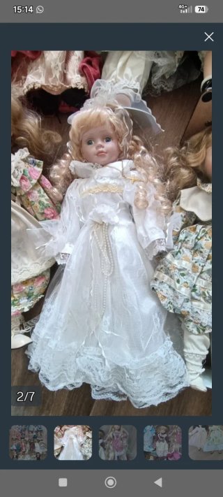 Muñeca de porcelana vintage