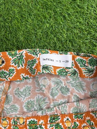 Falda estampada naranja y verde