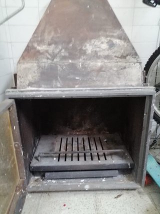 Caset de chimenea obra metal y cristal