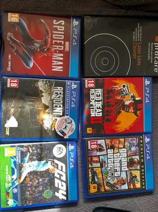 PS4 (PlayStation 4) Negra + Juegos y Mandos