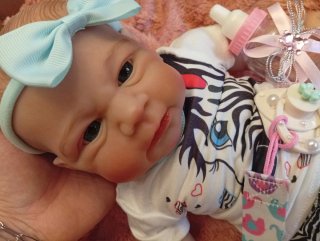 Hermosa bebé reborn vinilo y tela con peso y caída