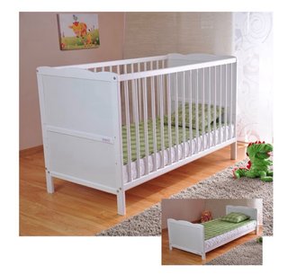 Lettino/culla bianco per bambini.