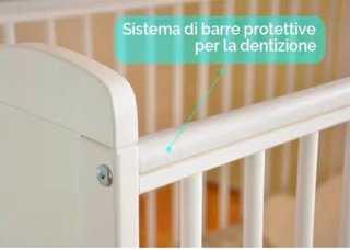 Lettino/culla bianco per bambini.