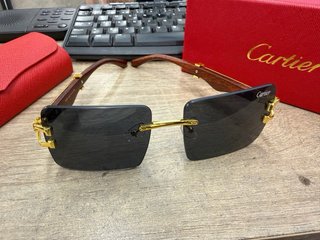 Gafas de sol Cartier Oro y Negro