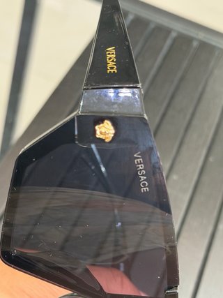 Gafas de sol Versace negras y doradas