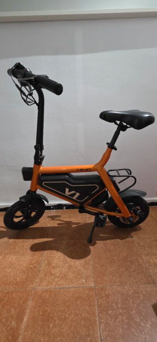 Bicicleta electrica xiaomi naranja con pedales