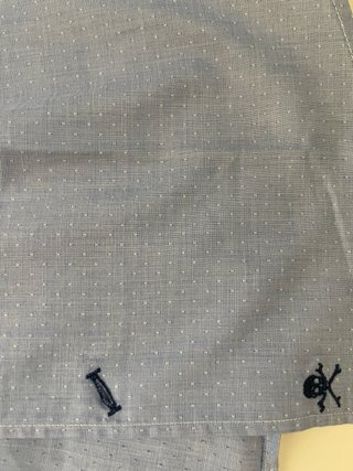Camisa Scalpers azul con estampado floral