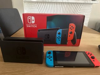 Nintendo Switch Completa. Cargador y Dock oficial