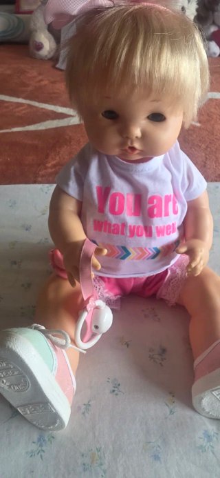 Muñeca Nenuco con chupete y ropa
