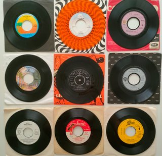 Discos de vinilo a 1 € Pop español rock metal funk