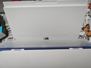 Impresora HP azul y blanca