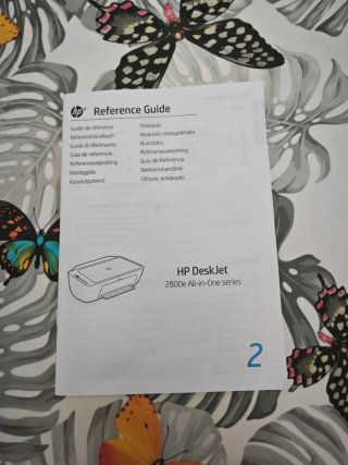 Impresora HP azul y blanca