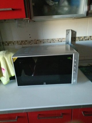 Tu Microondas 900w con función grill