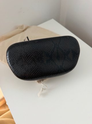 Bolso Zara asa dorada efecto piel serpiente